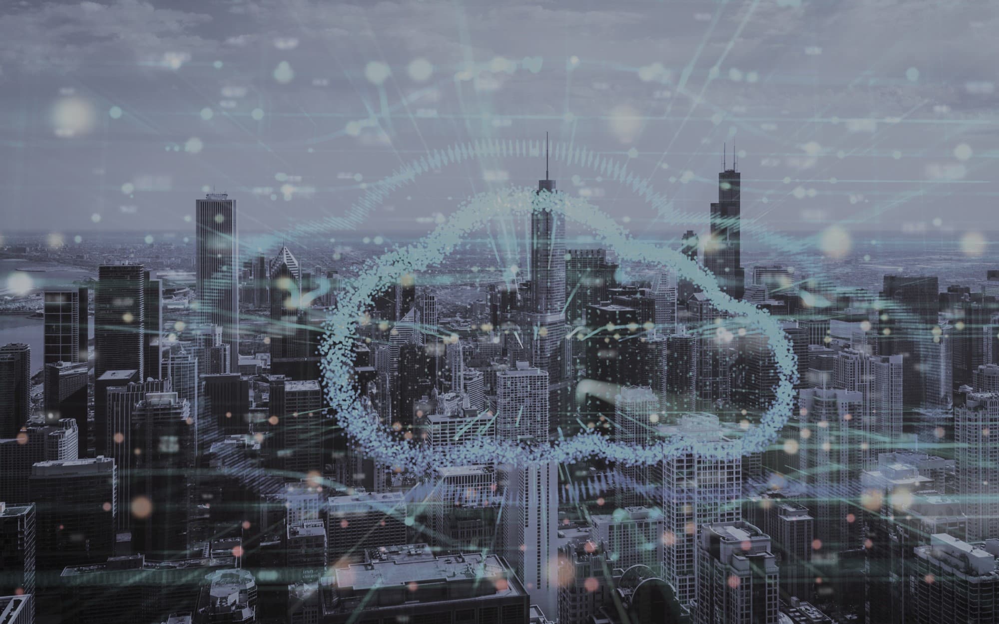 Cloud icon superimposed on busy city, dark