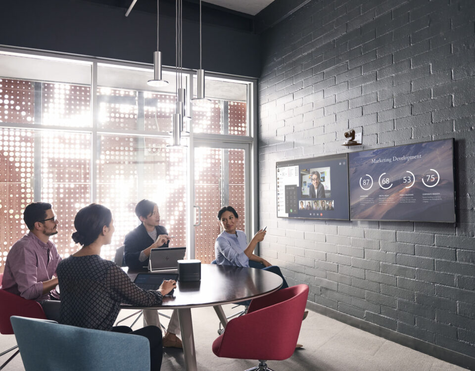 conference room stone wall video meeting round table