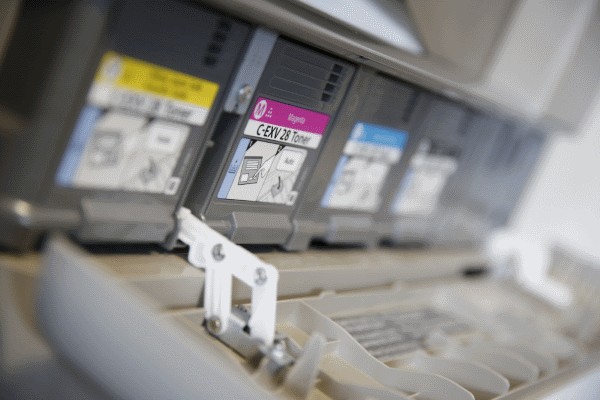 interior of printer showing ink cartridge tray