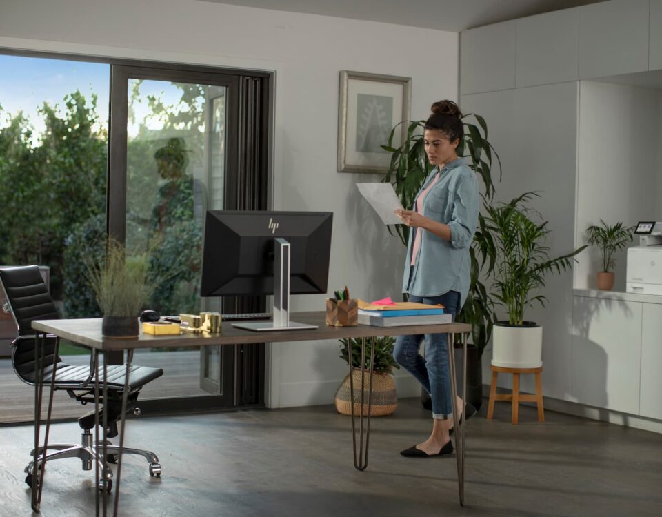 hp printer monitor woman in home office