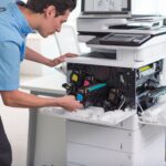 apogee engineer replacing printer toner