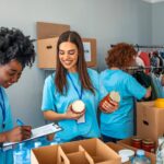 woman unpacking boxes in charity drive