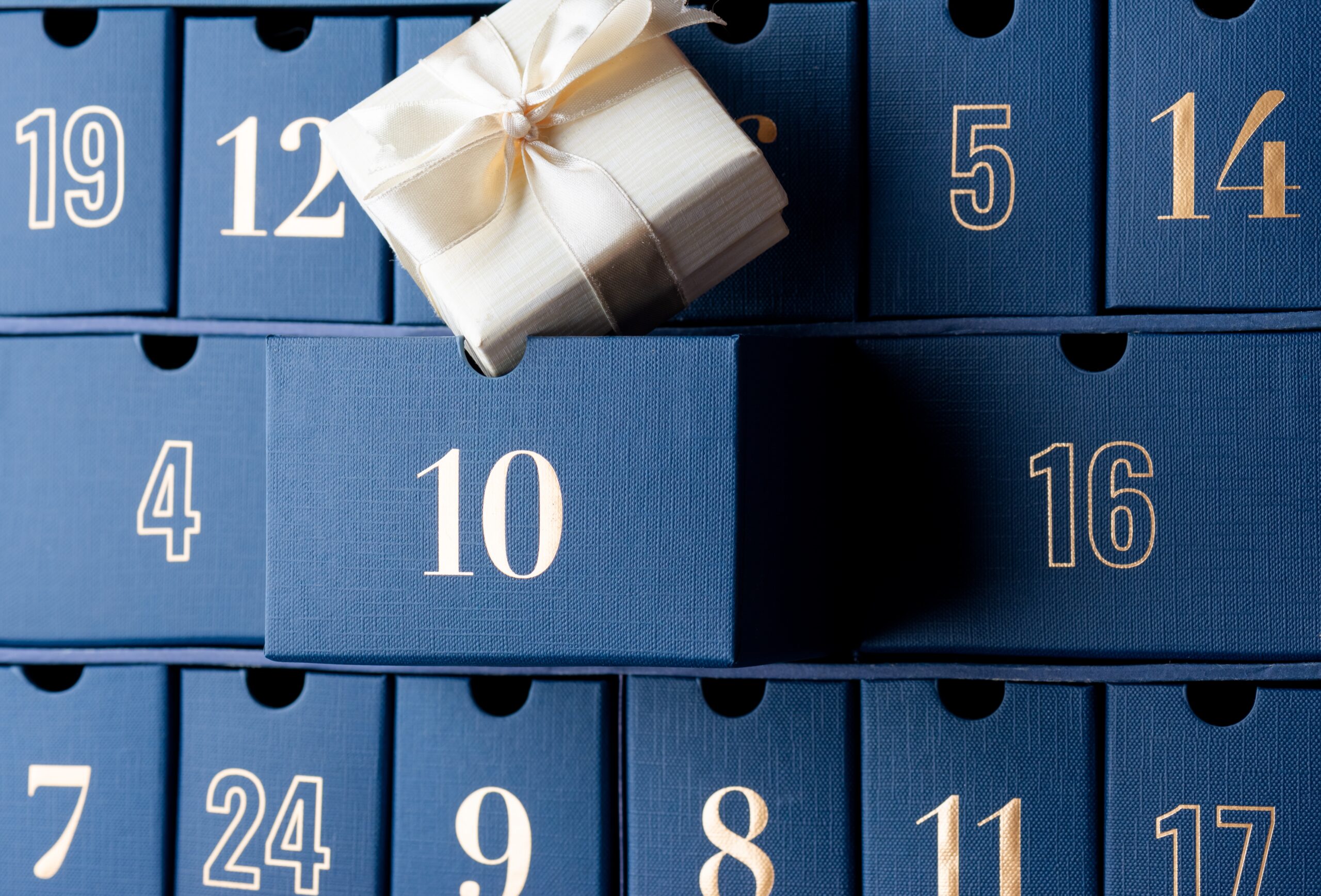 Blue advent calendar with open box